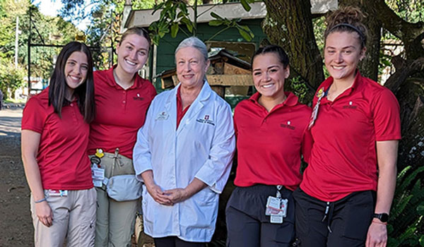 Four IU School of Nursing students and Dr. Bethany Murray pose for a photo during a summer study-abroad trip to Eldoret, Kenya, in 2024.