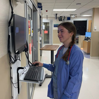 Roxy Bewley uses a computer during her summer internship at the Mayo Clinic.