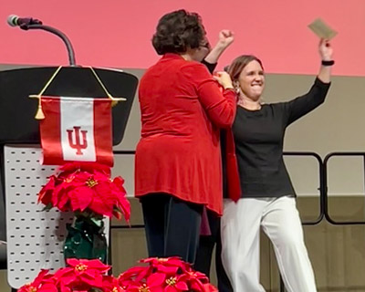 Graham Ruselink celebrates her graduation from the IU School of Nursing in Fort Wayne during the pinning ceremony.